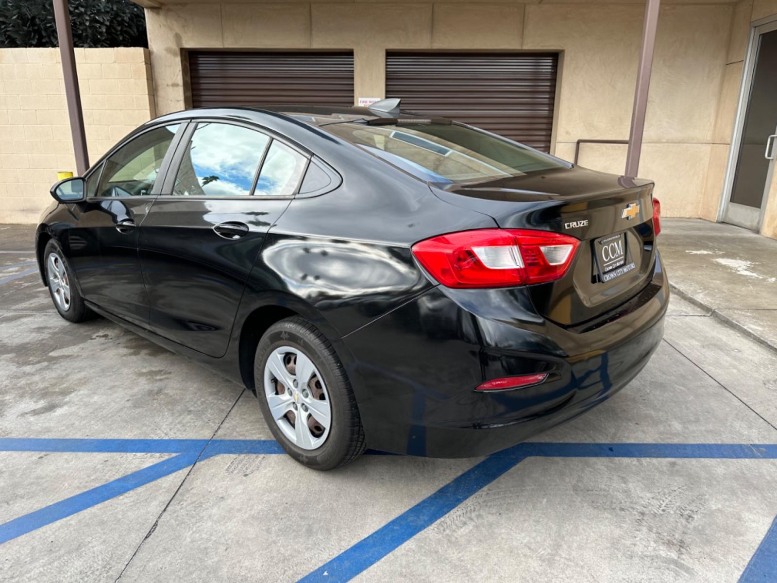 2017 Black /BLACK Chevrolet Cruze LS Auto (1G1BC5SM6H7) with an 1.4L L4 DOHC 16V TURBO engine, 6A transmission, located at 30 S. Berkeley Avenue, Pasadena, CA, 91107, (626) 248-7567, 34.145447, -118.109398 - Crown City Motors is a used “Buy Here Pay Here” car dealer in Pasadena CA. “Buy Here Pay Here” financing, means that when you purchase your vehicle from our dealership, that you make the payments to the dealership as well. We do not need the banks approval to get you approved for a used auto - Photo #2